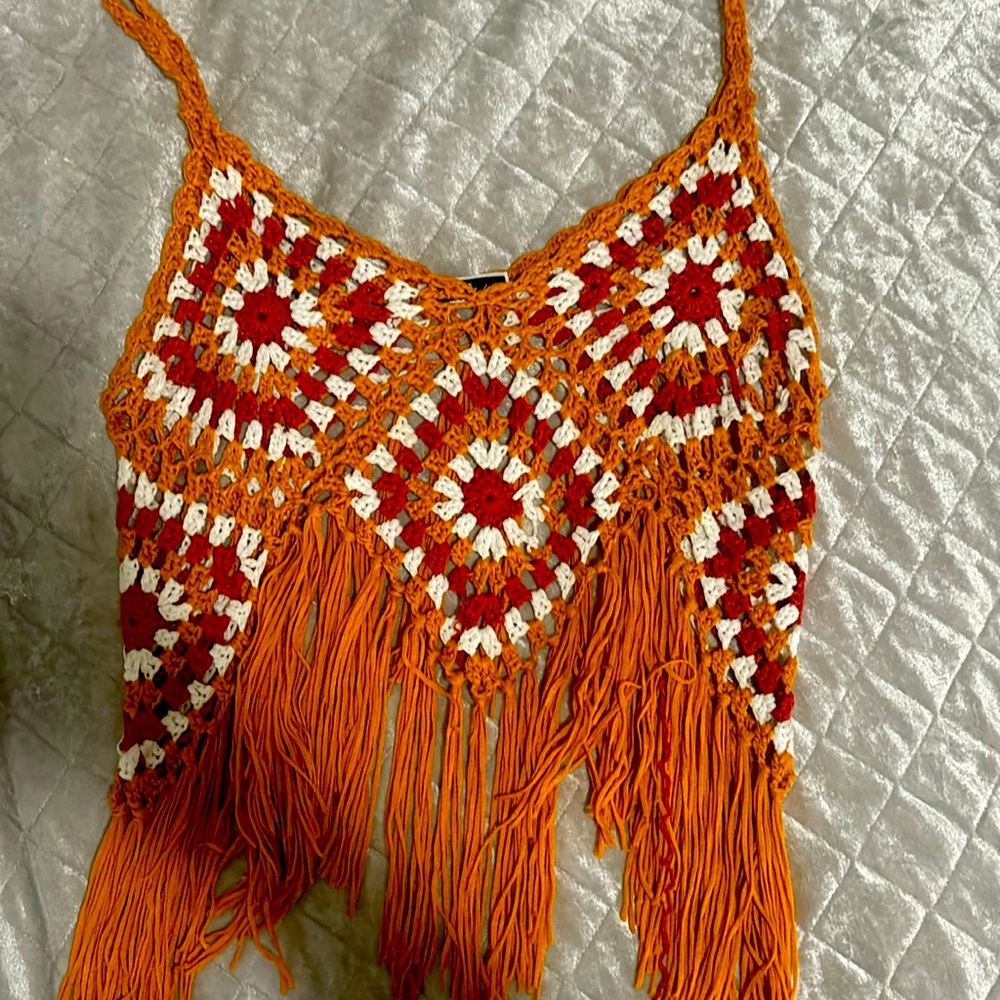 Orange knitted top has never been worn